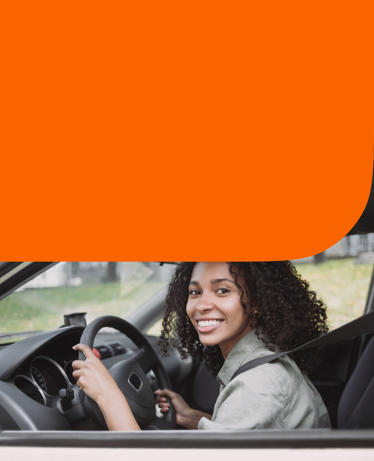A woman driving a car