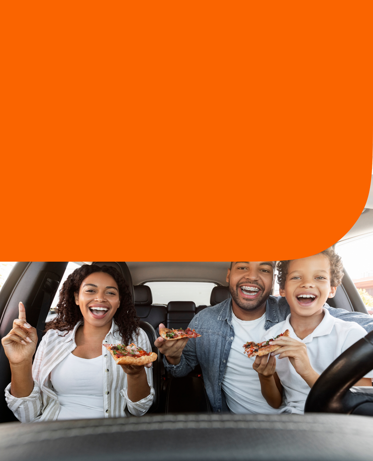 A family eating in their car