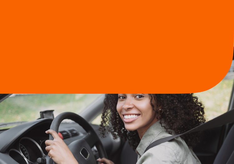 A woman driving a car