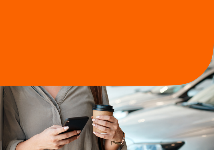 A woman checks car buying resources