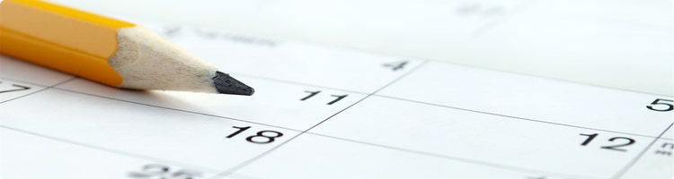 Pencil on calendar to indicate best times to buy a car