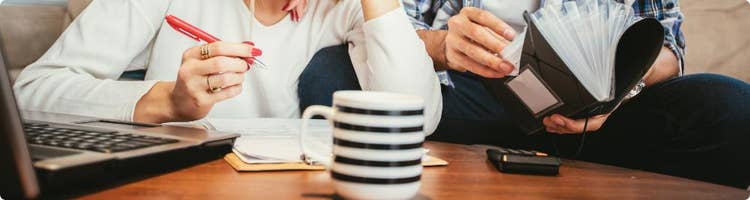 credit-challenged couple doing taxes