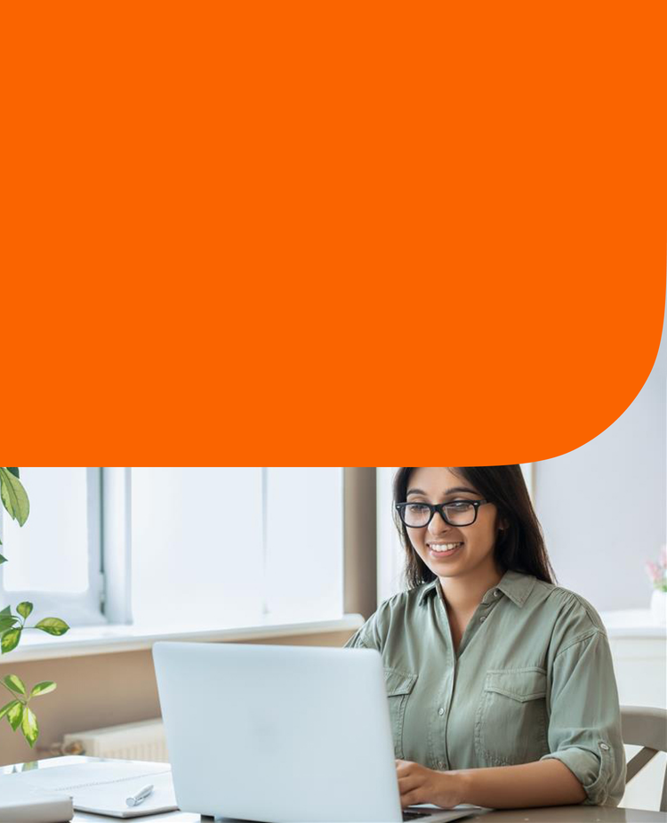 A woman uses her laptop.