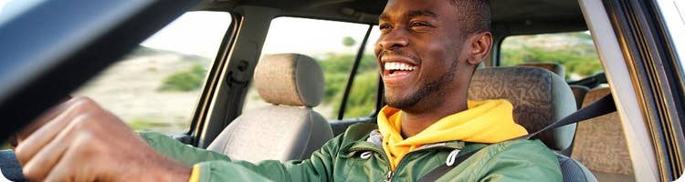 happy man drives car