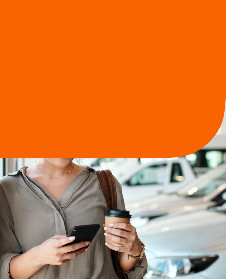 A woman checks car buying resources