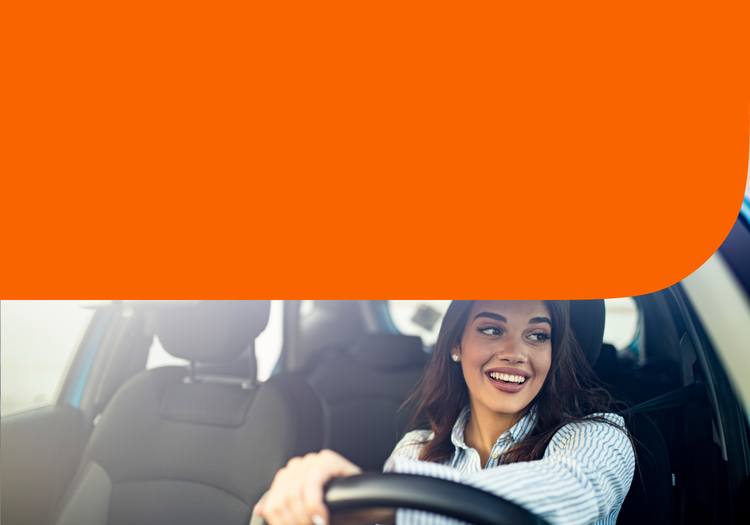 A woman behind the wheel of a car