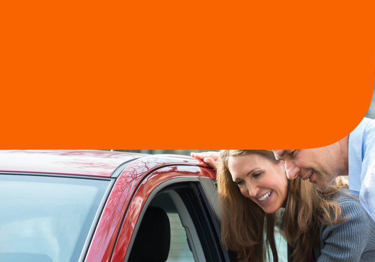 A couple evaluates a used car